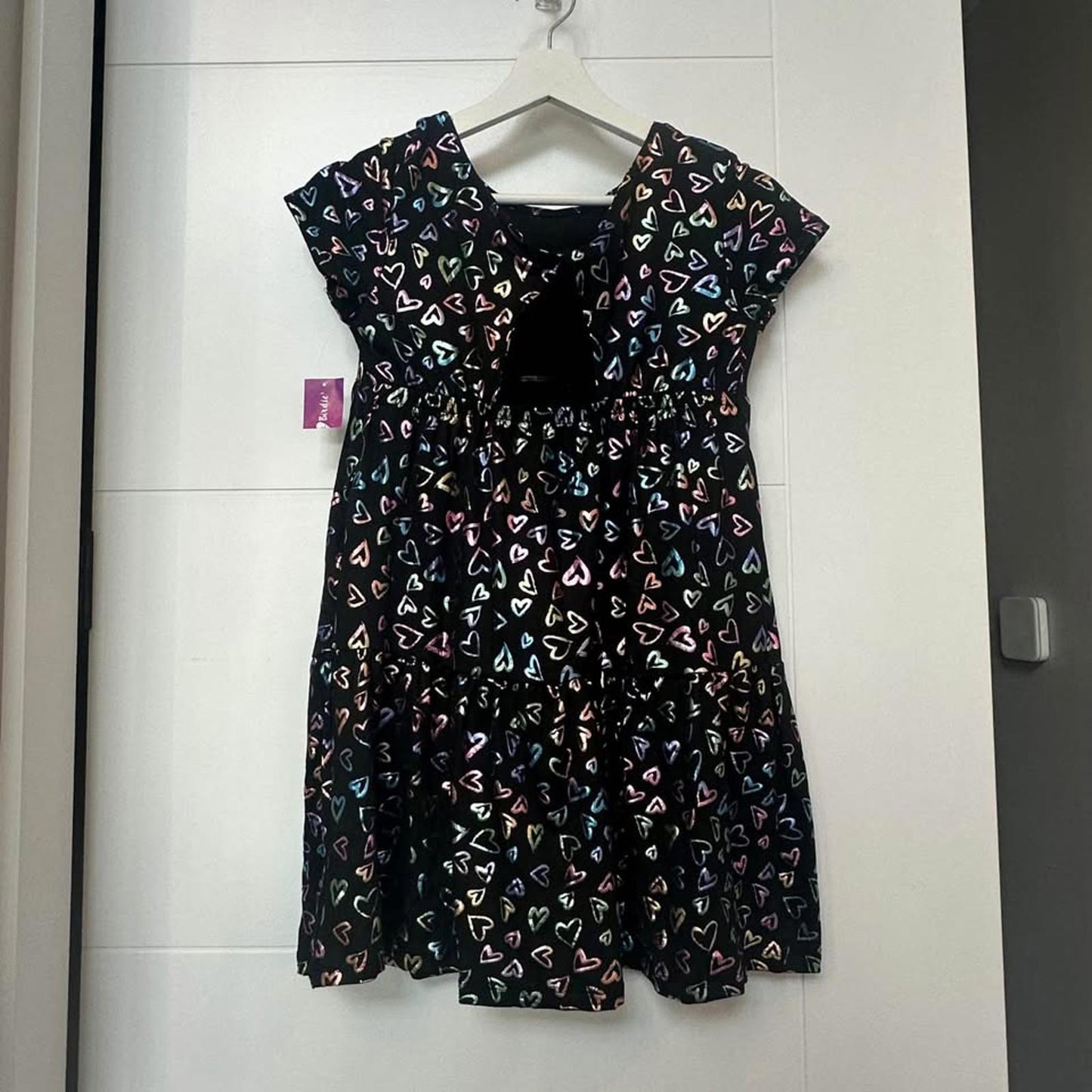 Brand new kids black dress with metallic hearts & back cut-out size Small (7/8)