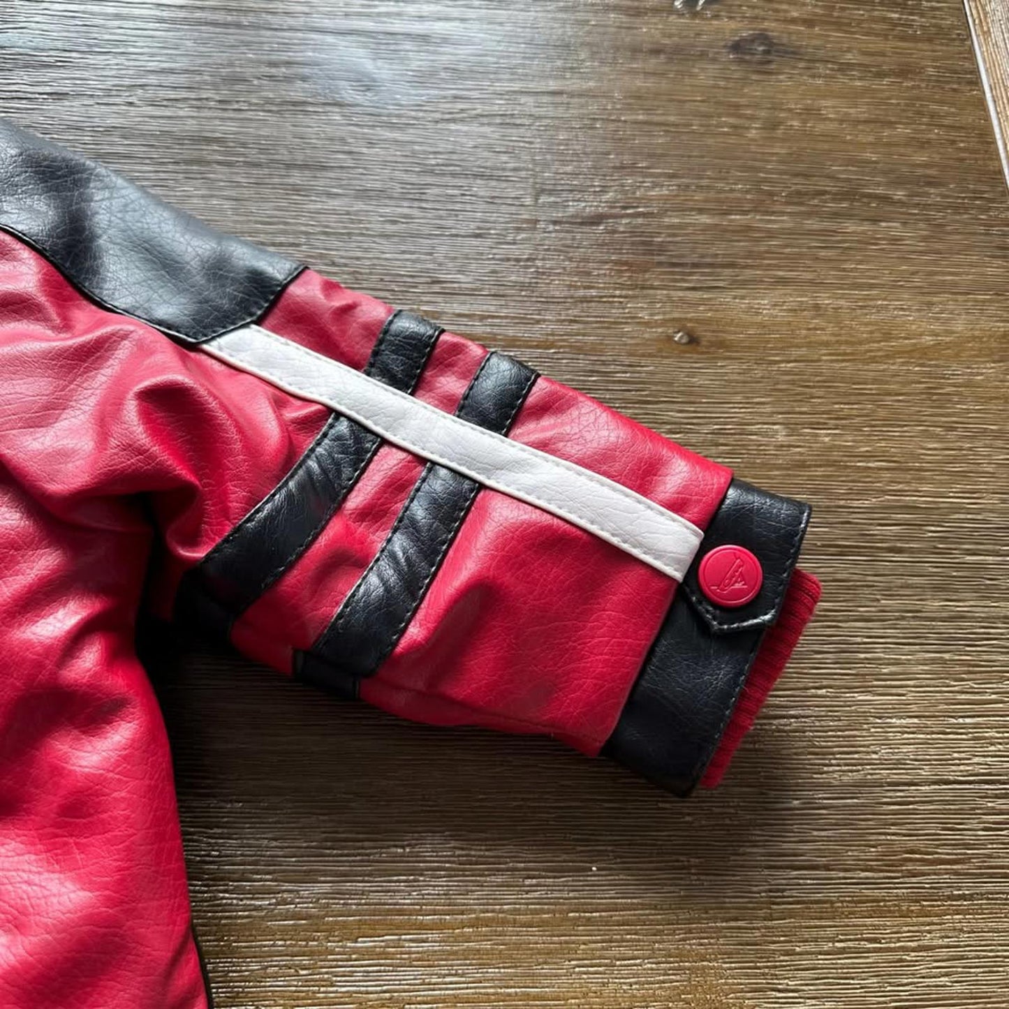 The Cars Lightning McQueen baby faux leather jacket with patches size 12 months