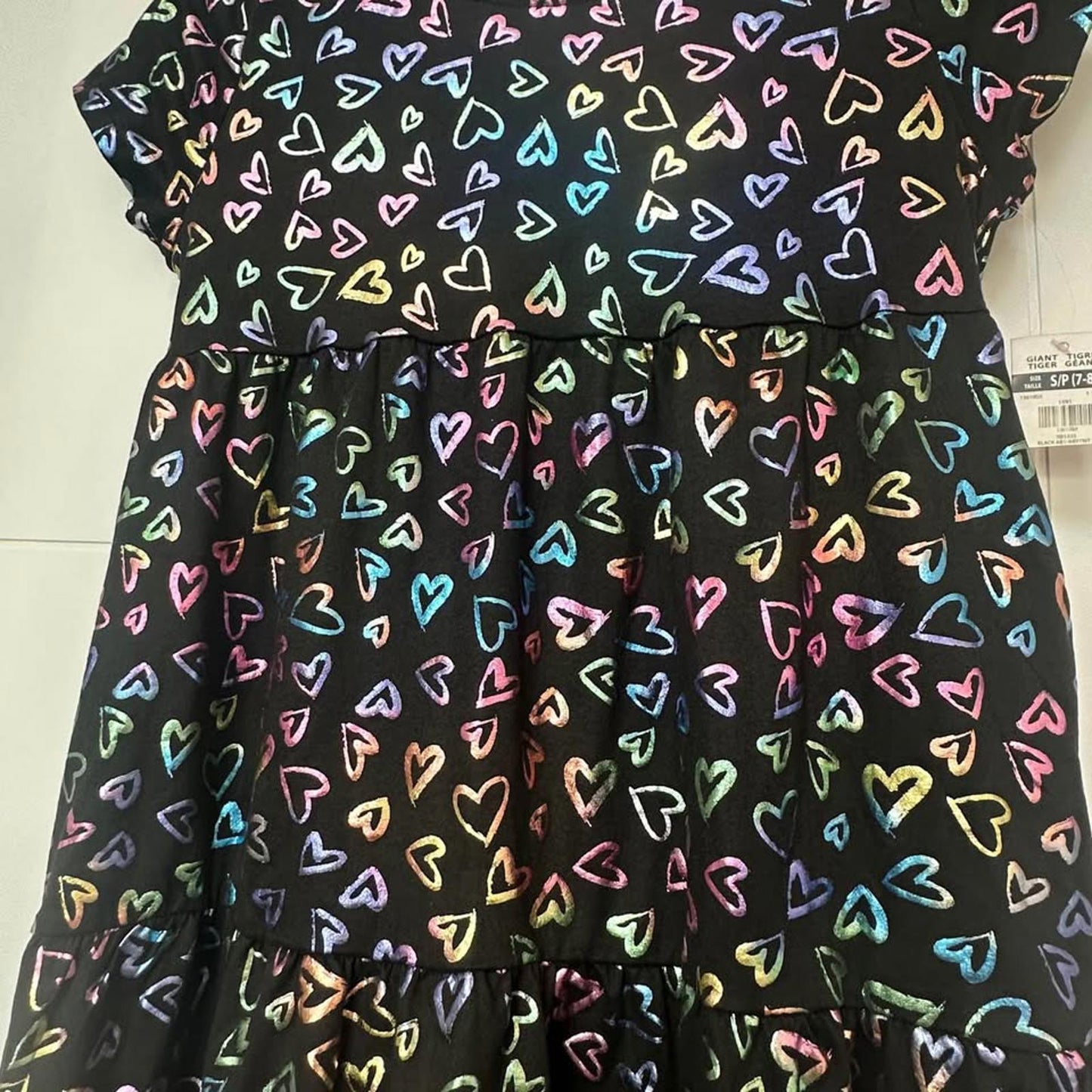 Brand new kids black dress with metallic hearts & back cut-out size Small (7/8)